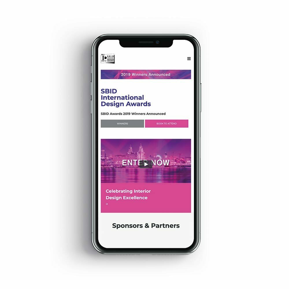 Mobile view of the SBID International Design Awards site with “2019 Winners Announced” and “Enter Now” call to action.