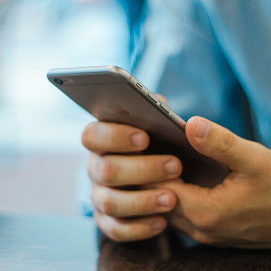 Hands holding a smartphone