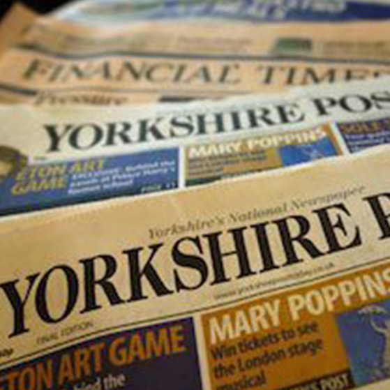 Stack of newspapers, including the Financial Times and Yorkshire Post.