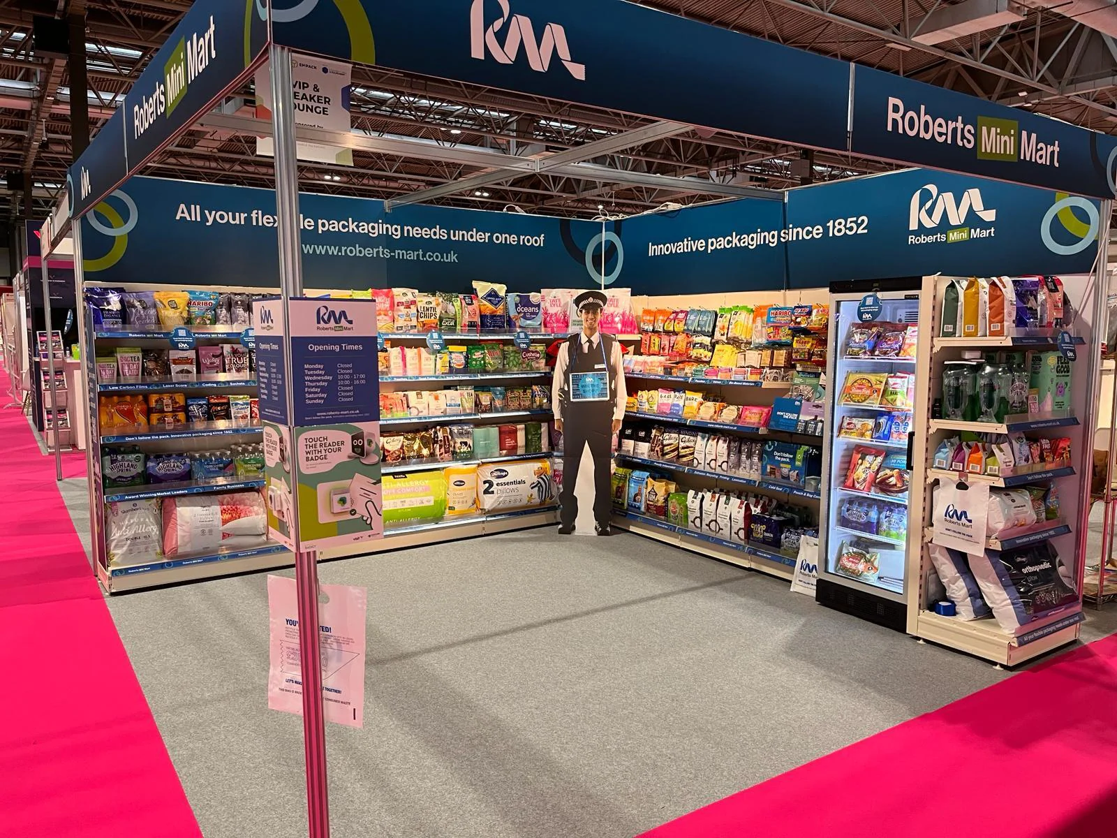 Image of Roberts Mart exhibition stand at the NEC. Innovative packaging displayed as a mini mart