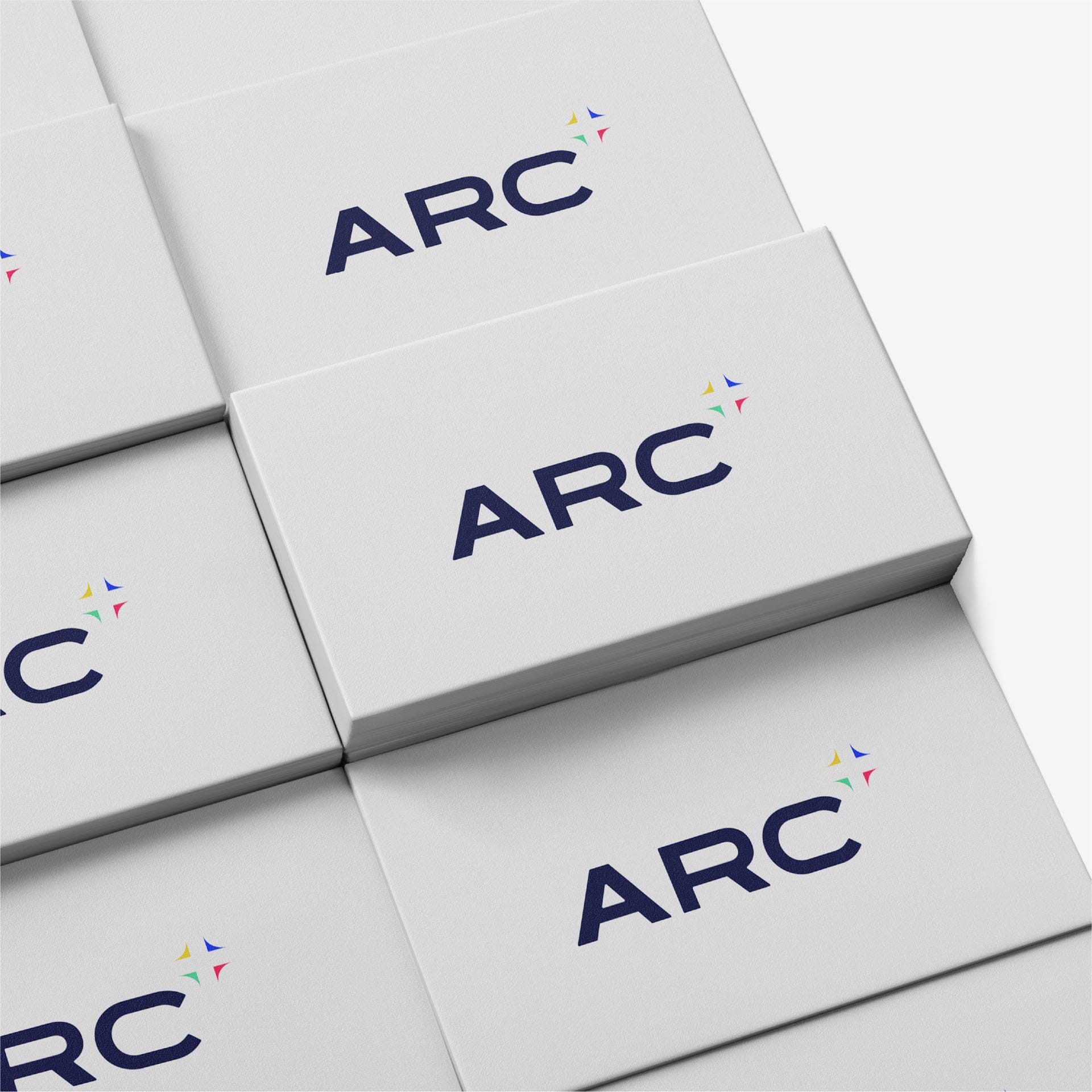 Stacked white boxes printed with the ARC logo.
